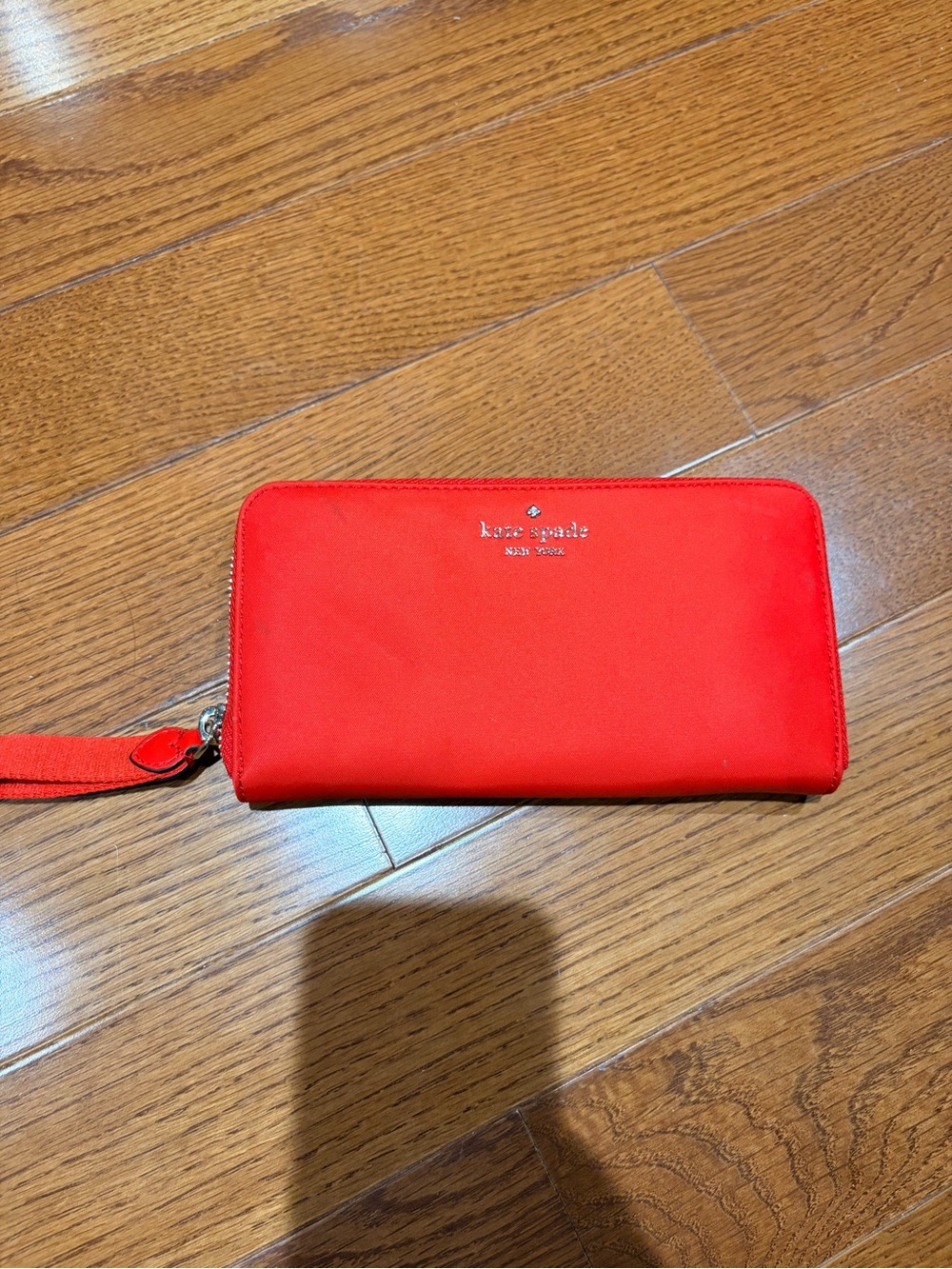 kate spade red zip-around wristlet wallet